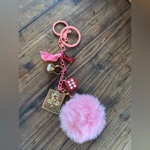 Pink furry ball dice cowboy boot rose ring bag charm keychain.
